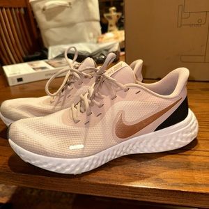 Pink and black Nike shoes